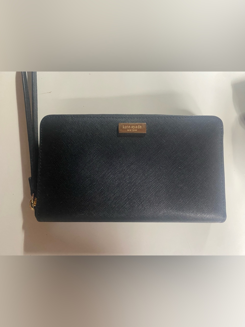 kate spade black zip wristlet with gold-tone hardware